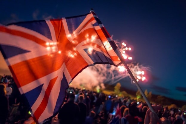 people holding flags during night time